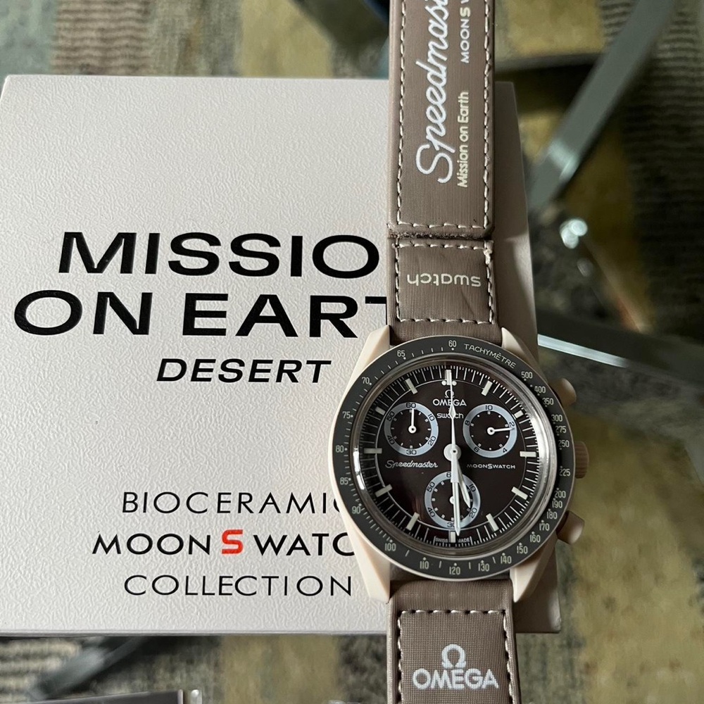 Omega Men's Brown and Tan Watch